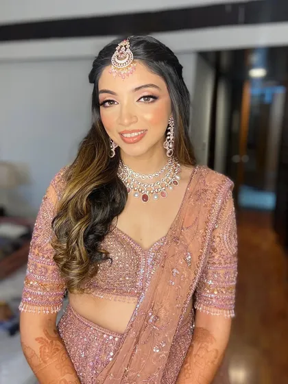 Hetal's radiant smile completes her perfect engagement look.