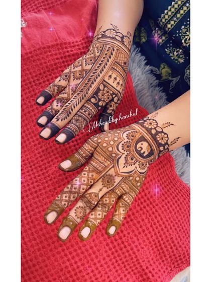 A Karwachauth design with an elephant in a mandala on one hand and a geometric pattern on the other.