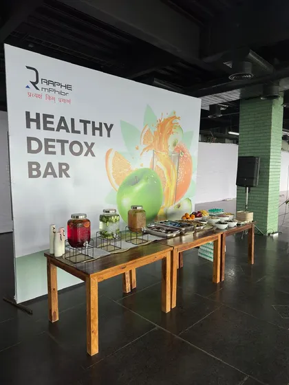 Wellness is a holistic concept. For corporate events, I can help integrate elements like this Healthy Detox Bar, which offers nutritious refreshments to complement the yoga practice and support the overall health goals of your team.