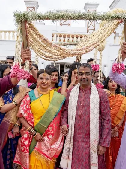 The bride's entrance with her family at her destination wedding, a moment filled with tradition and emotion.