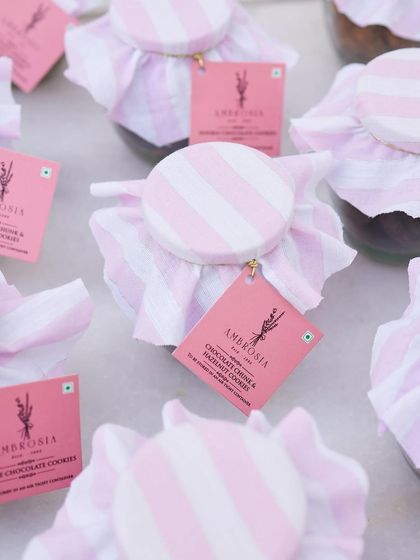 A close-up of our cookie jars with custom tags, perfect for making any celebration extra special.