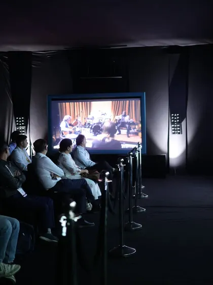 Attendees experiencing an immersive home cinema demonstration, one of the most popular features of the expo that allows brands to showcase their AV excellence.