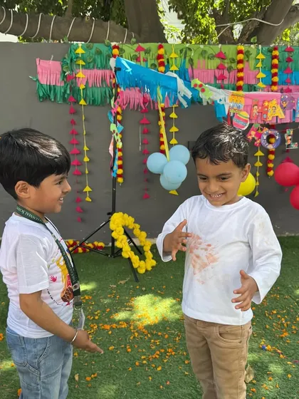 Friends celebrating Holi together. I love seeing the children share moments of joy and laughter during our festival parties.