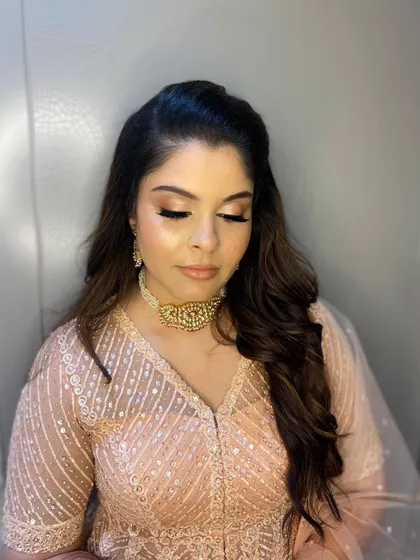 A close-up of Simran's engagement eye makeup, featuring soft, neutral tones and a touch of shimmer.
