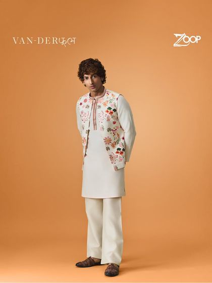 Celebrate the art of intricate design. This off-white kurta with a floral embroidered Nehru jacket from the Vanderphool collection is perfect for those who appreciate fine craftsmanship.