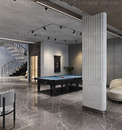 A large, open-plan party hall in Palam Vihar, complete with a pool table, multiple seating areas, and a modern, industrial aesthetic.