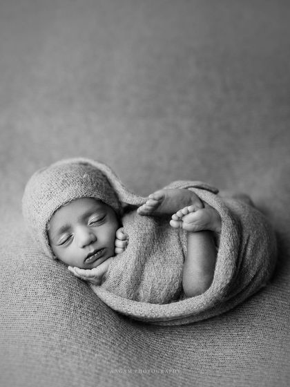 The same pose in black and white, which gives it a powerful, fine-art quality.