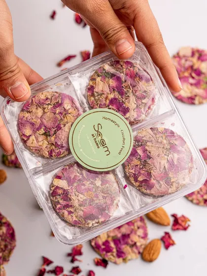 A unique twist on a classic, my rose and almond chikki is a delight for the senses. The delicate rose petals and crunchy almonds make it a beautiful and delicious treat for Sankranti.