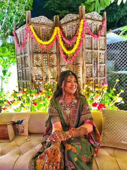 A candid, smiling shot of the bride from the previous image, capturing a moment of pure joy.
