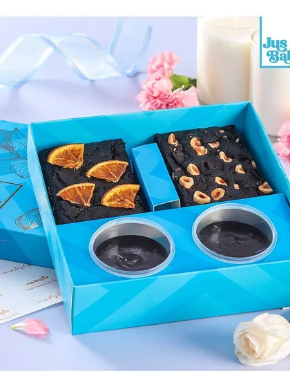 Our 'Guilt-Free Happiness Box' for Rakhi, featuring healthier brownie options like orange and hazelnut, along with chocolate dips.