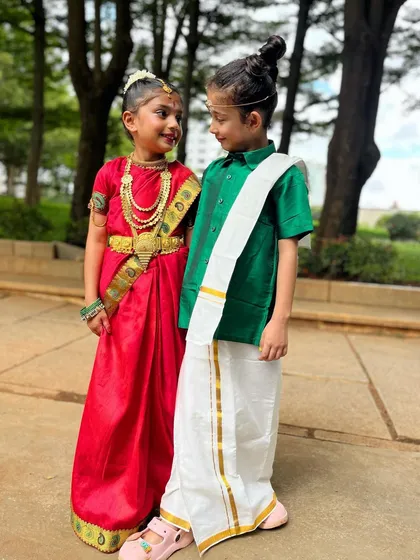 Cuteness overload. Our little dancers sharing a sweet moment in their traditional outfits, showcasing the friendships that blossom at our studio.