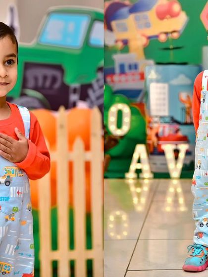 A thrilling 'Hot Wheels' themed birthday party, with checkered flags, car cutouts, and a custom racetrack backdrop, perfect for little speed enthusiasts.