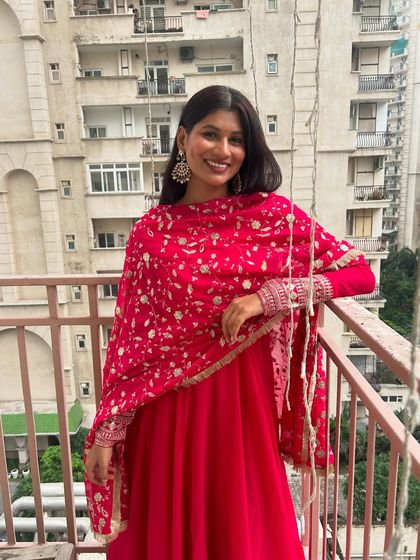 A full, twirling shot of this beautiful pink anarkali. The flowing silhouette is perfect for festive celebrations, offering both elegance and comfort.