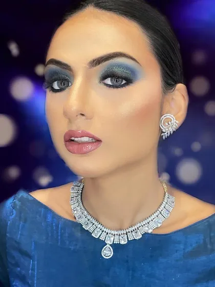 A direct look showcasing the power of a smokey eye and lash combination. The lashes are dense at the base and wispy at the tips, which helps to elongate the eye shape and add a touch of sophistication.