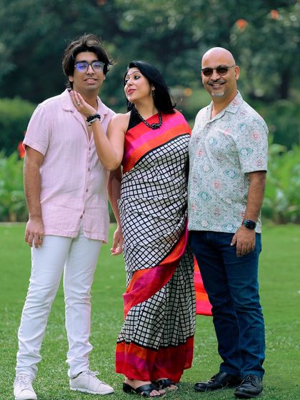 A playful interaction during a family photoshoot. These are the moments that truly reflect the love and fun within a family unit.