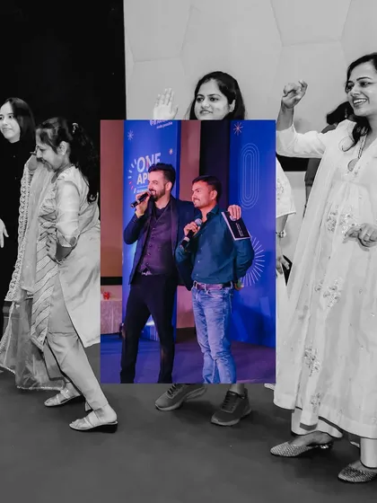 Interacting with employees on stage during a fun segment at the Applied Materials event.