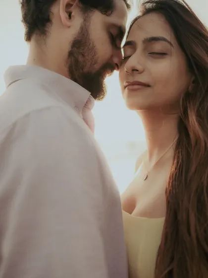 A close-up of a tender moment, with eyes closed in contentment. These are the 'in-between' shots that hold so much emotion.