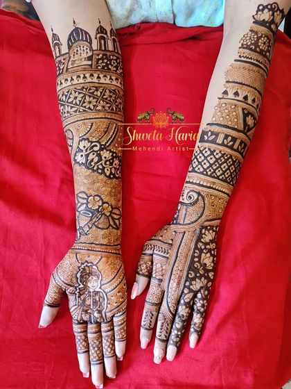 This image displays the front and back of the hands, showing a cohesive design story with a bride portrait on one palm and intricate patterns on the other.