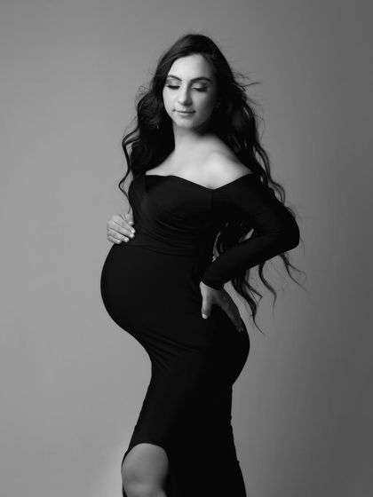 Another angle of this gorgeous solo portrait. I love how the simple black gown and flowing hair create a look that is both strong and feminine.