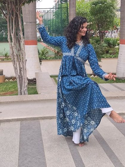 A full-length view of a dynamic pose from my semi-classical birthday performance.