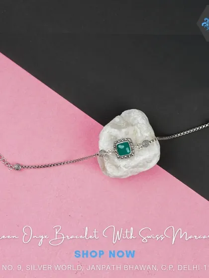 This delicate bracelet features a square green onyx stone and Swiss marcasites on a fine silver chain.