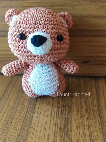 A simple and sweet teddy bear charm, perfect for adding to a set of keys or decorating a child's backpack.