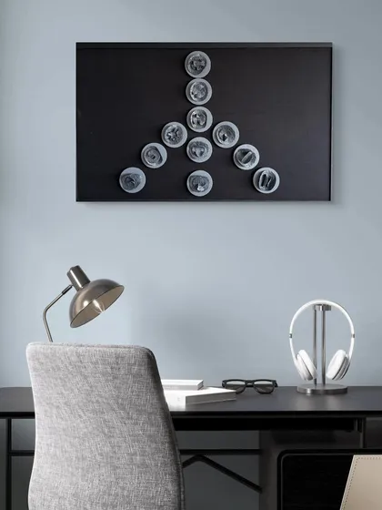 The 'Peace' symbol from the Cutting Edge series shown in a study. It's a perfect visual reminder to bring calm and focus to a workspace.