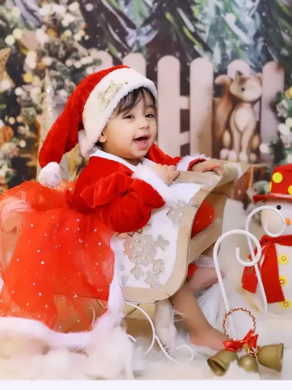 Feeling the festive spirit in our Christmas sleigh. Our holiday-themed sessions are filled with joy, featuring Santa costumes and a winter wonderland backdrop.