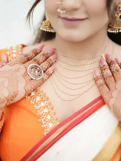 A close-up of the hands, focusing on the simple yet beautiful mandala pattern. This is a great option for sangeet or engagement ceremonies.