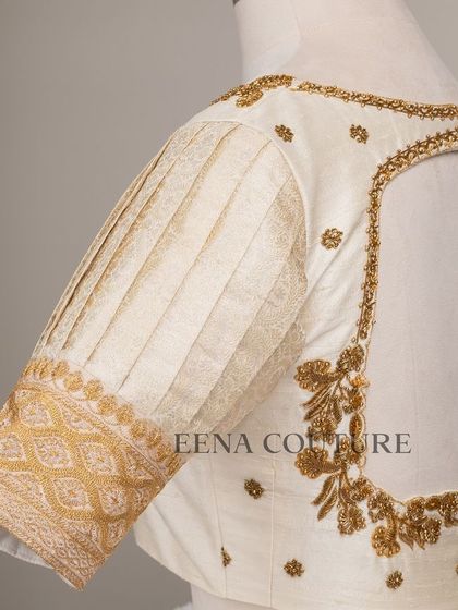 This video showcases an ivory-toned blouse with pleated puff sleeves and gold embroidery. It highlights the intricate handwork and traditional materials that go into every piece I create for my brides.