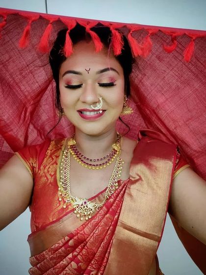 The bright, smiling expression of the model shows the confidence that great makeup can inspire, a key skill we teach.