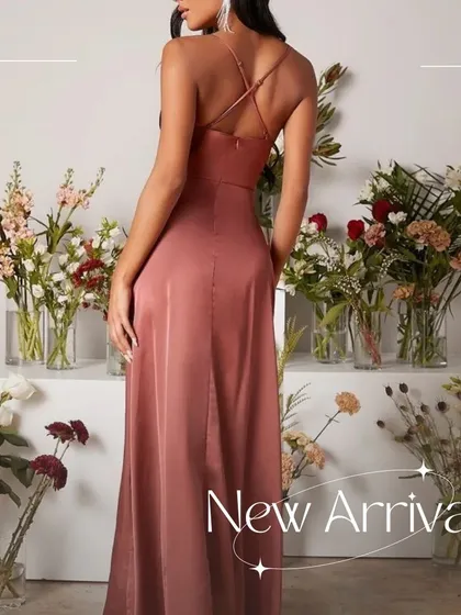 The back view of the Mauve satin dress, revealing the elegant criss-cross strap detail.
