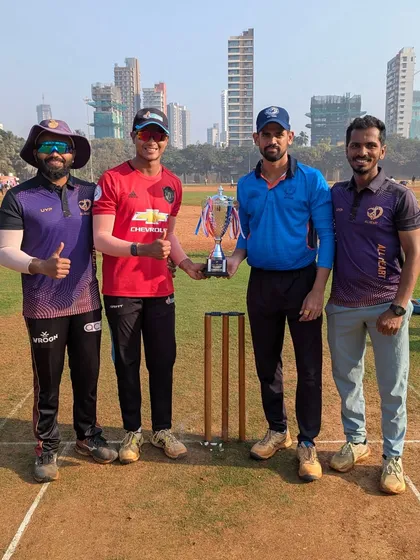 The captains pose with the trophy before the start of the All Heart T20 League. All Heart Strikers versus All Heart Mesmerizers.