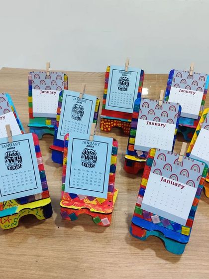 The finished products! A set of personalized desk calendars, all painted and assembled by the kids themselves.