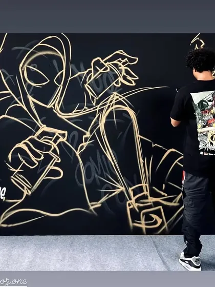 The first step of any live piece: the sketch. Here I am laying down the initial gold lines for my Spider-Man mural at Comic-Con.