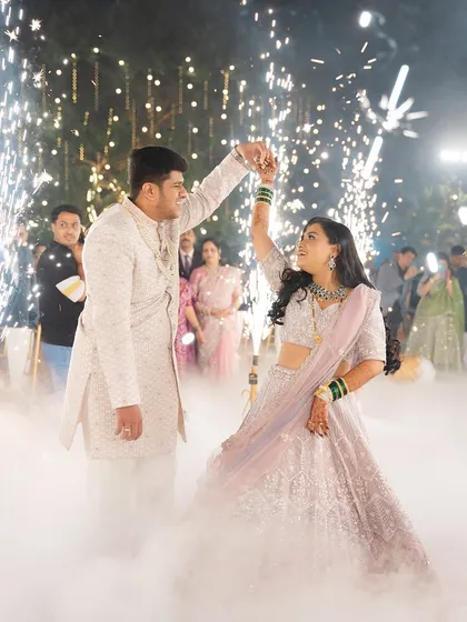 Another shot of their beautiful dance, capturing the joy and energy of the moment.