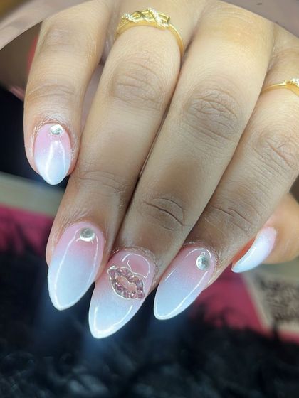 Ombré birthday nails with a sparkling 3D lip charm and rhinestone accents.