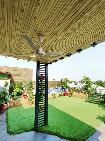 We pay attention to the details. This pergola features a beautiful bamboo-clad ceiling and an integrated fan, ensuring the space is comfortable even on warm days.