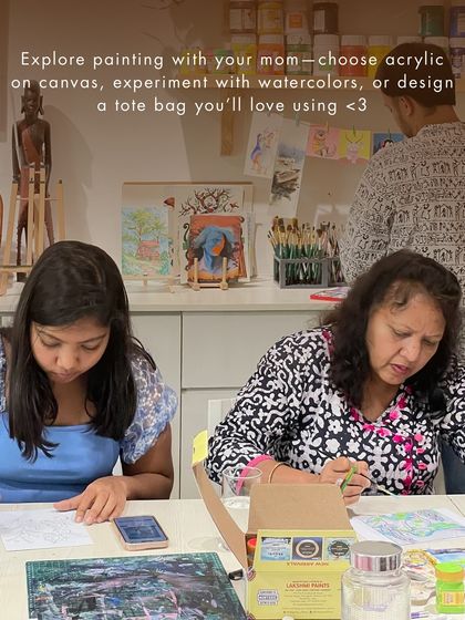 Another moment from our Mother's Day celebration, where a mother and daughter explore painting together, creating a custom tote bag.