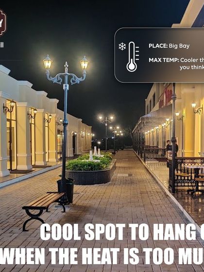 A cool spot to hang out when the heat is too much. This night shot of our walkway is presented as a weather report, promising a temperature "cooler than you think."