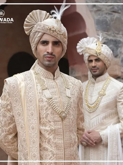 Two grooms from the Shauhar collection, showcasing different styles of embroidery and safas. This highlights the personalized approach I take to creating royal wedding wear.