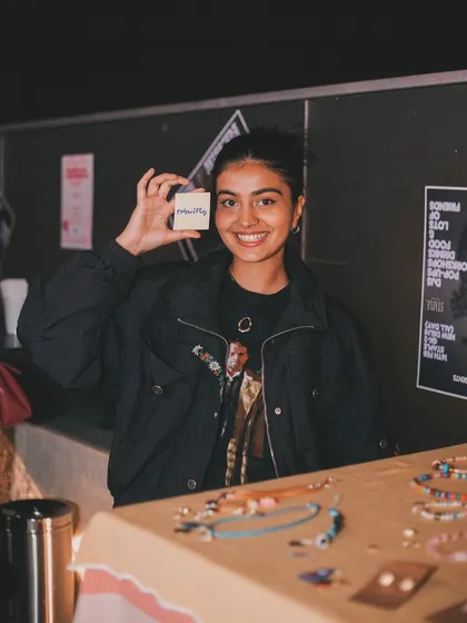 At Lush Loft, it's not just about music. We also feature art and local creators, like this jewelry maker showcasing her work. It's about building a whole creative scene and supporting the community.