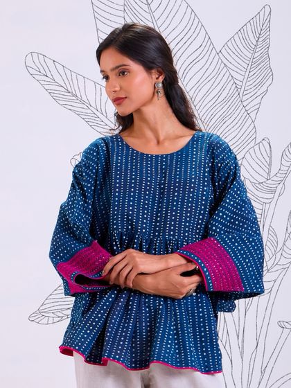 A closer look at our Chaaya relaxed fit top. The combination of hand-block print and an easy silhouette makes it a go-to piece for hot, humid days.