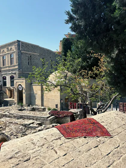 The beautiful juxtaposition of soft textiles against ancient stone in Baku's old city. This is the kind of visual storytelling I love to create.
