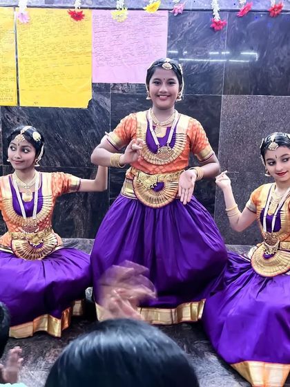 My younger students in their lovely purple and orange costumes for a performance at the Jnana Saraswati temple.