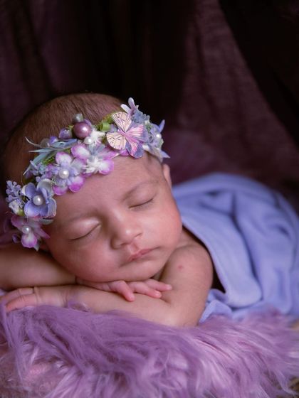 The perfect profile. This shot captures the sweet curve of the baby's lips and nose, a detail parents will want to remember forever.