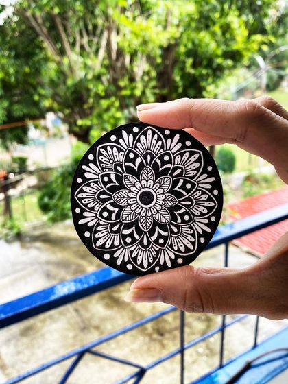A simple yet elegant mini mandala in black and white. These smaller pieces are perfect for adding a touch of detailed art to any little corner of your home or office.