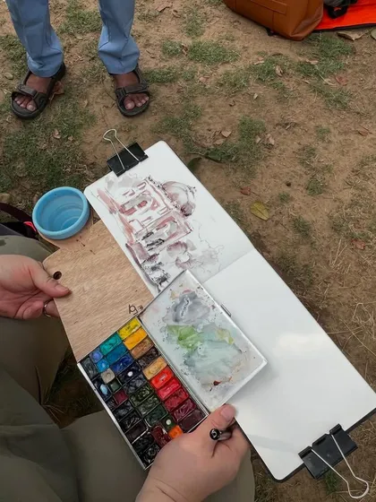 A behind-the-scenes look at a sketching session at Sunder Nursery. You can see another artist's beautiful watercolor palette and setup.