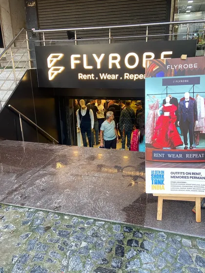 The entrance to our basement store in Delhi, where you can find outfits on rent for every occasion. As seen on Shark Tank India, our motto is "memories permanent."