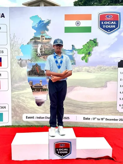Rayirth stands proudly on the winner's podium after his victory at the 2nd event of The New Delhi Fall Local Tour, organized by US Kids Golf.